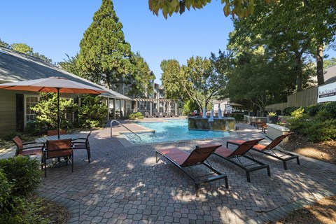 Pool lounge chairs at Park Summit Apartments in Decatur, GA 30033